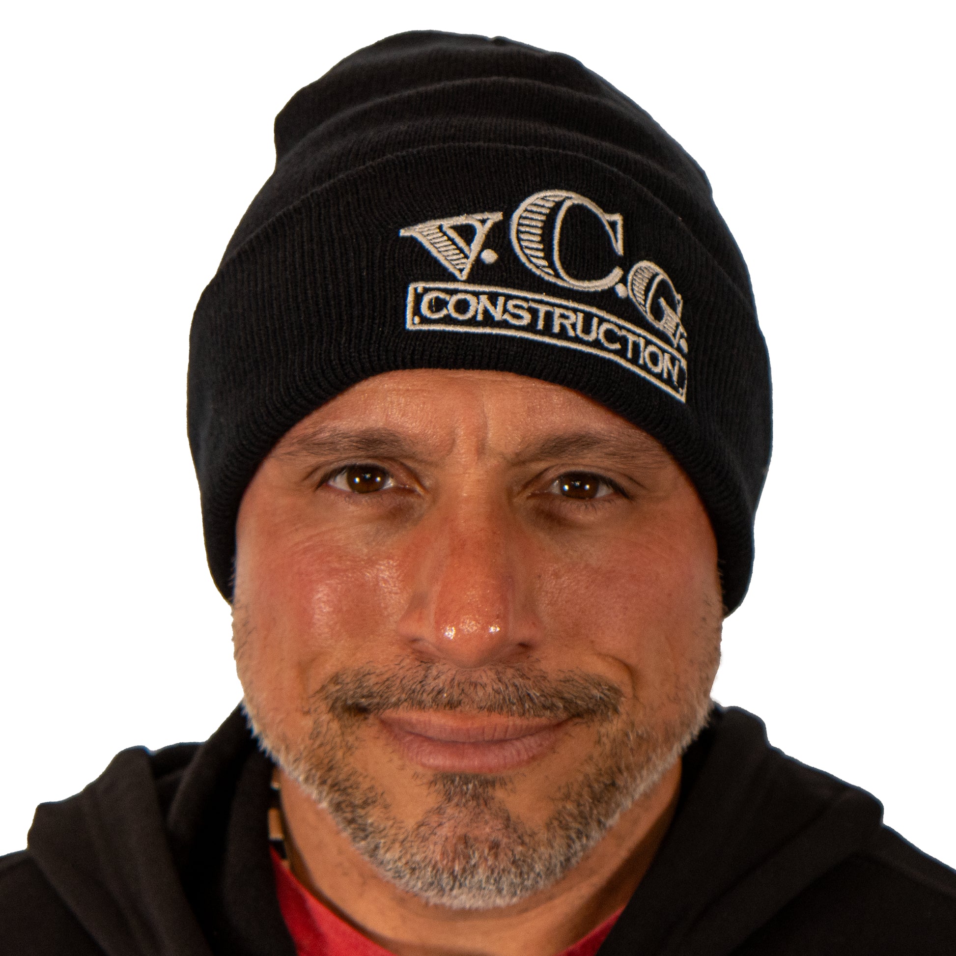 Vince wearing an embroiderd VCG Construction black knit beanie