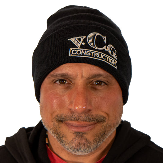 Vince wearing an embroiderd VCG Construction black knit beanie