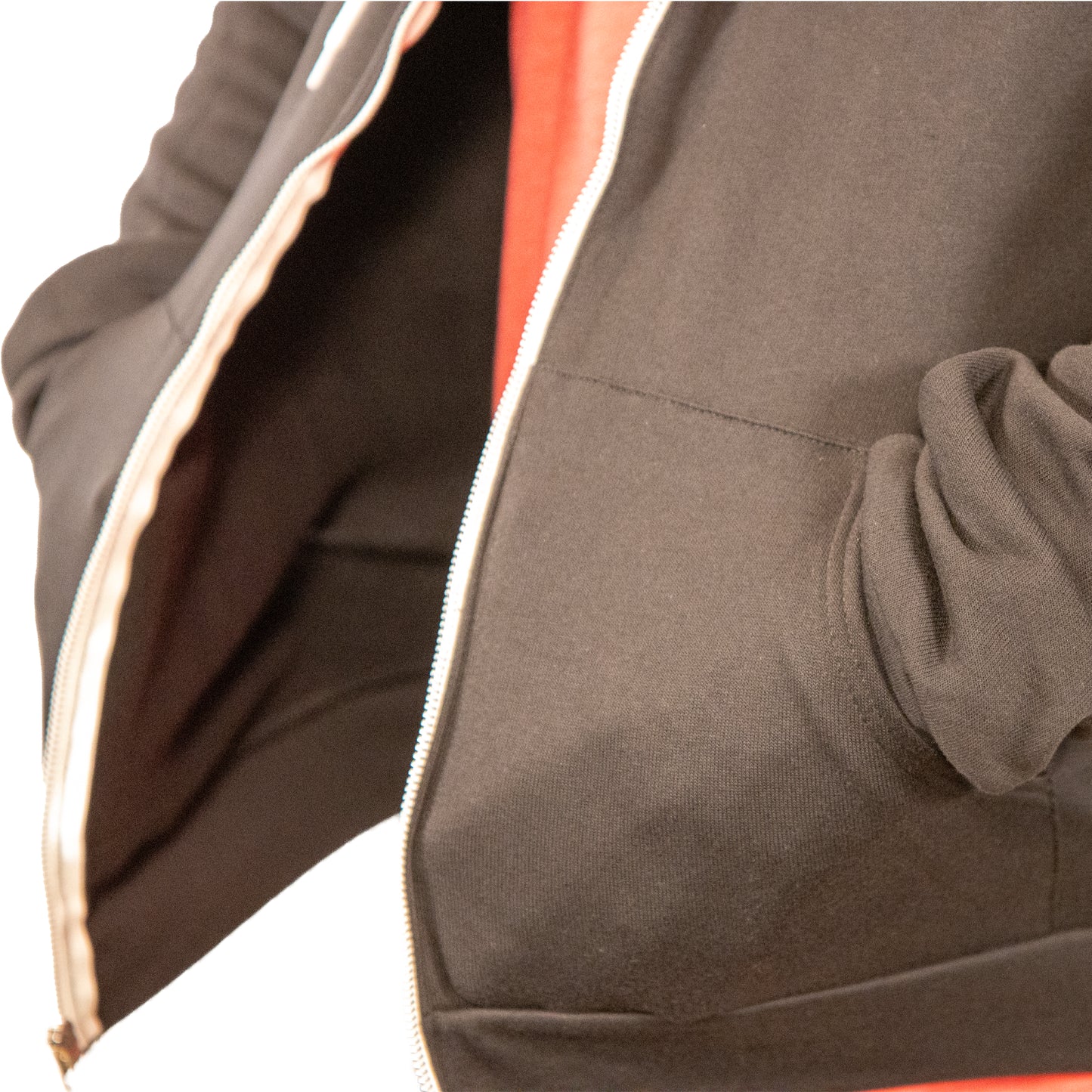 VCG Construction black zip-up hoodie with hands in pockets