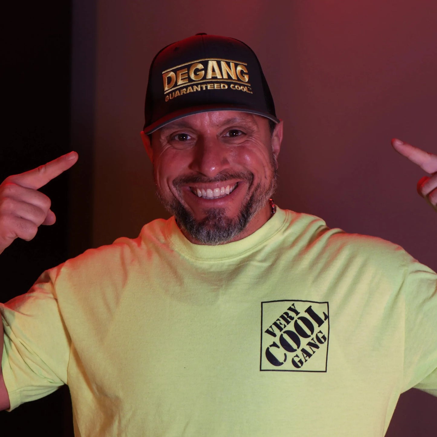 Step up your hat game with our unique two-tone Black and Grey Flexfit Trucker Mesh Cap, showcasing the lively Yellow DeGANG GUARANTEED COOL logo, meticulously embroidered for an added touch of style