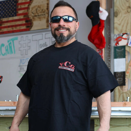 Elevate your casual wardrobe with our exclusive Black T-Shirt showcasing the original and meticulously embroidered VCG Construction LOGO. This stylish piece seamlessly blends comfort and craftsmanship for a distinct and timeless look