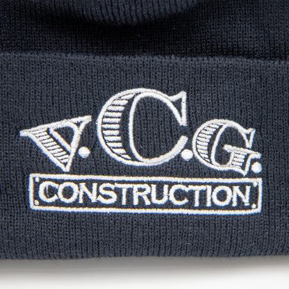 Close-up of VCG Construction logo embroidered on black knit beanie