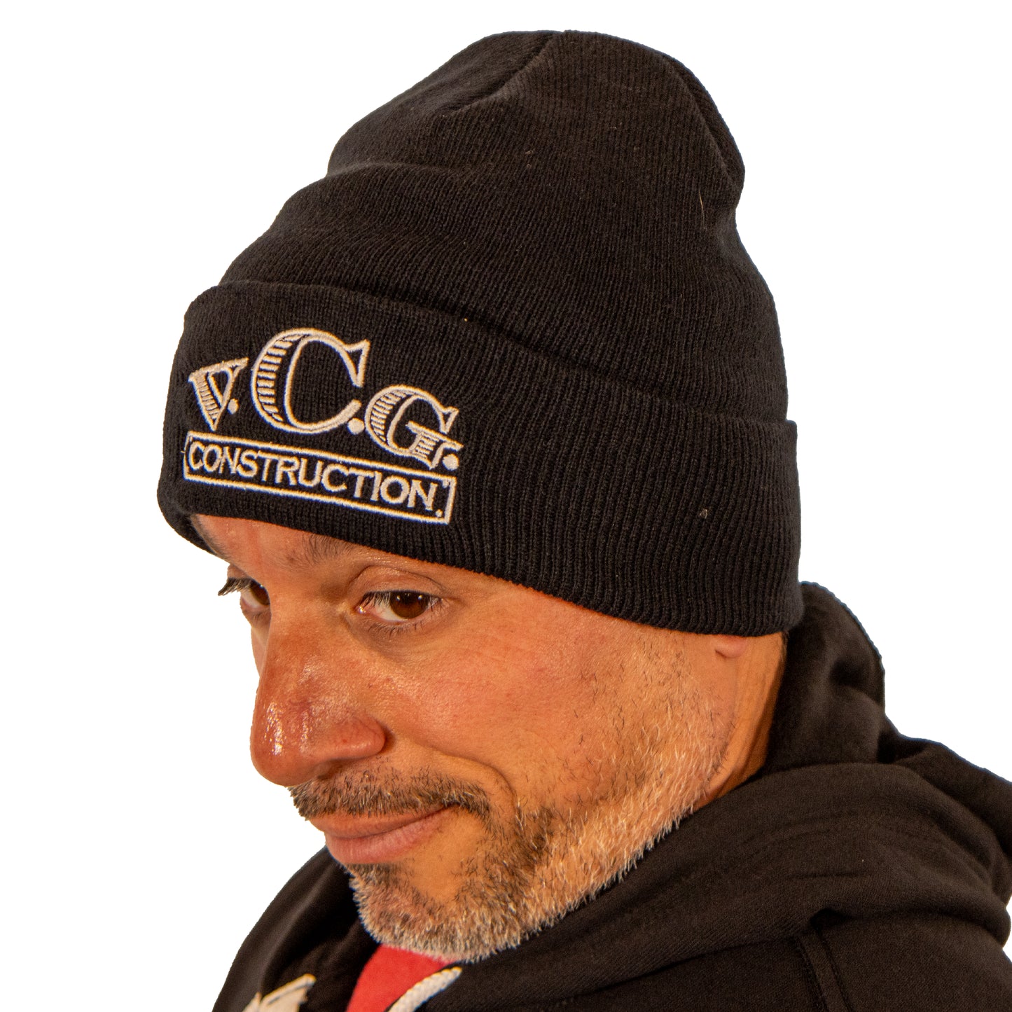 Left side view of VCG Construction black knit hat on model