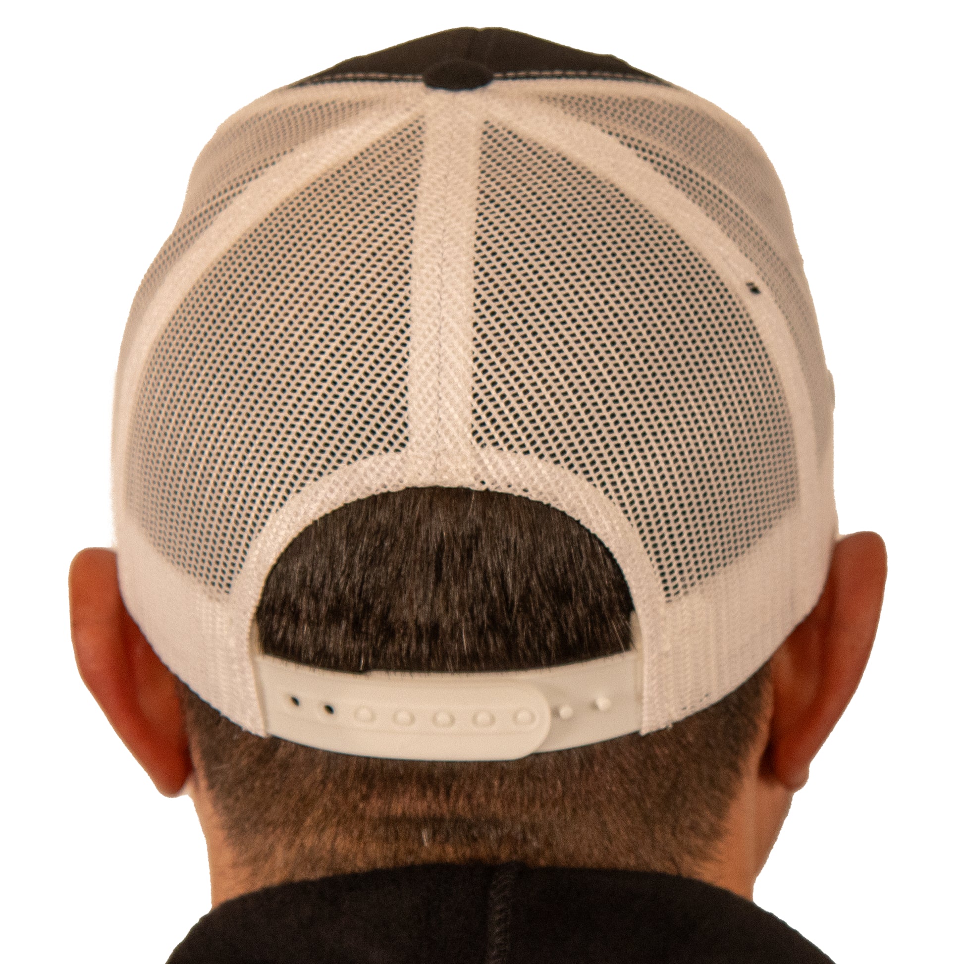 Back view of VCG Construction black and white snapback hat with adjustable snap