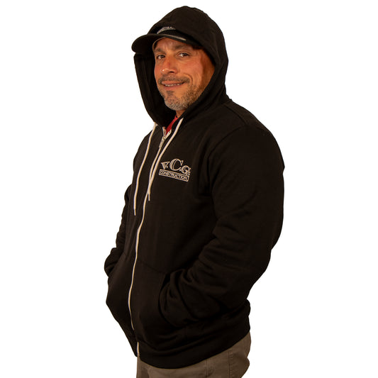 Side profile of VCG Construction black zip-up hoodie with hood up