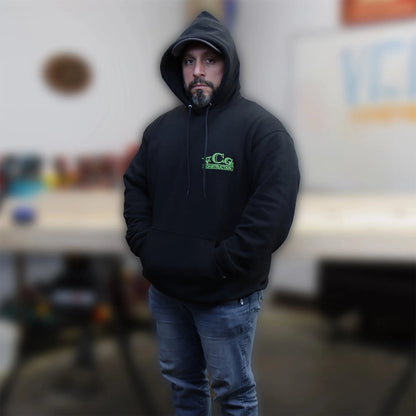 Elevate your style with this black hoodie featuring a bold high-visibility green embroidered VCG Construction logo, ensuring a distinctive and fashionable look