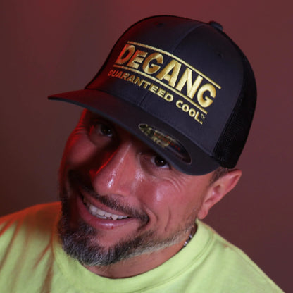 Enhance your hat collection with the unique flair of our dual-toned Black and Grey Flexfit Trucker Mesh Cap, showcasing the vivid Yellow DeGANG GUARANTEED COOL logo intricately embroidered